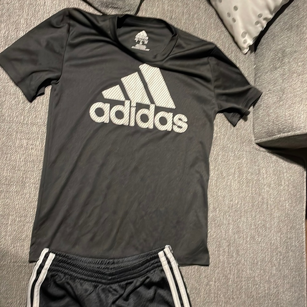 Adidas shirt size 8 and shorts sz 7x.  It’s not a set but selling both together